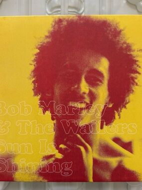 Source Unknown Bob Marley & The Wailers Yellow and Red Vinyl Cover Art